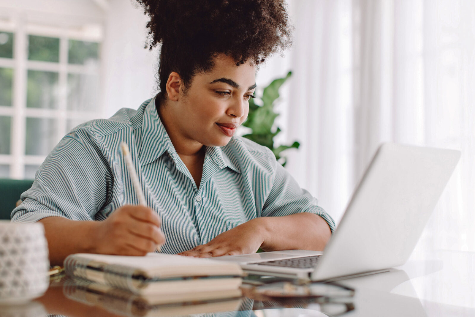 Businesswoman looking busy working from home